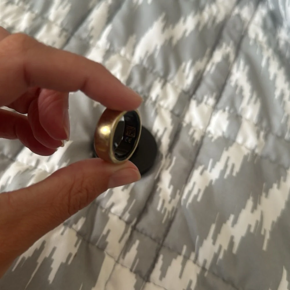 Oura Ring in Black with Gold Trim
